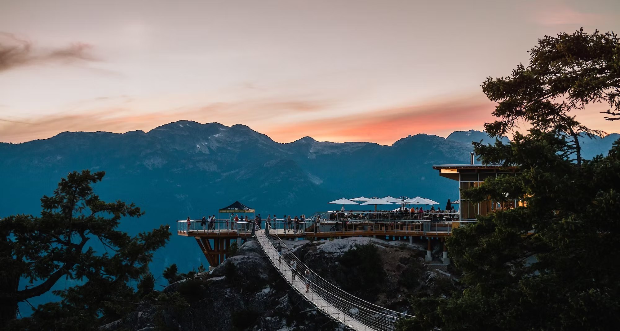 The Sea to Sky Gondola summit lodge and viewing deck at sunset