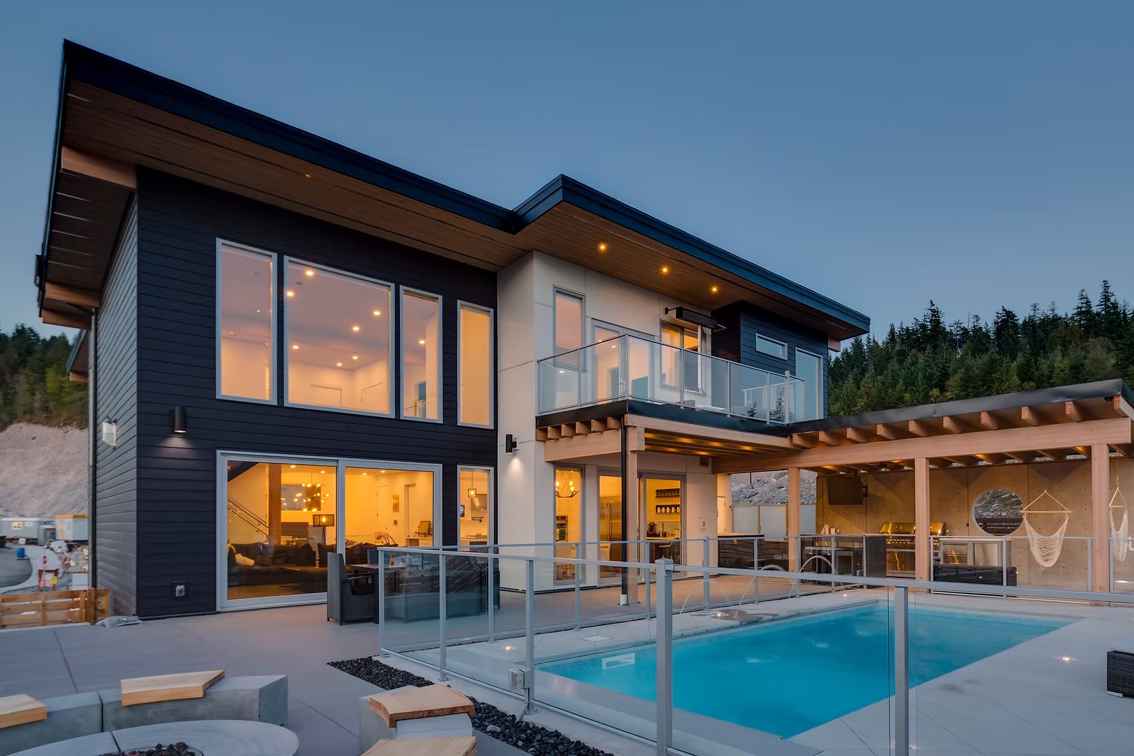Dowad Drive custom home and pool at dusk